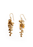 MEGAN PARK Gold Leaf Tendril Earrings featuring cascading brushed gold leaves suspended from fine gold chains.