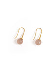 MEGAN PARK Rose Quartz Drop Earrings featuring polished blush-pink rose quartz spheres suspended from fine gold-plated hooks.